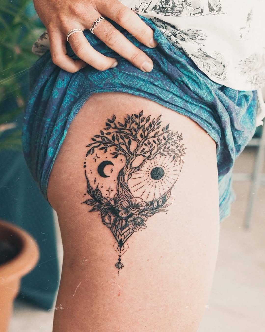 Elegant tree of life tattoo with celestial elements