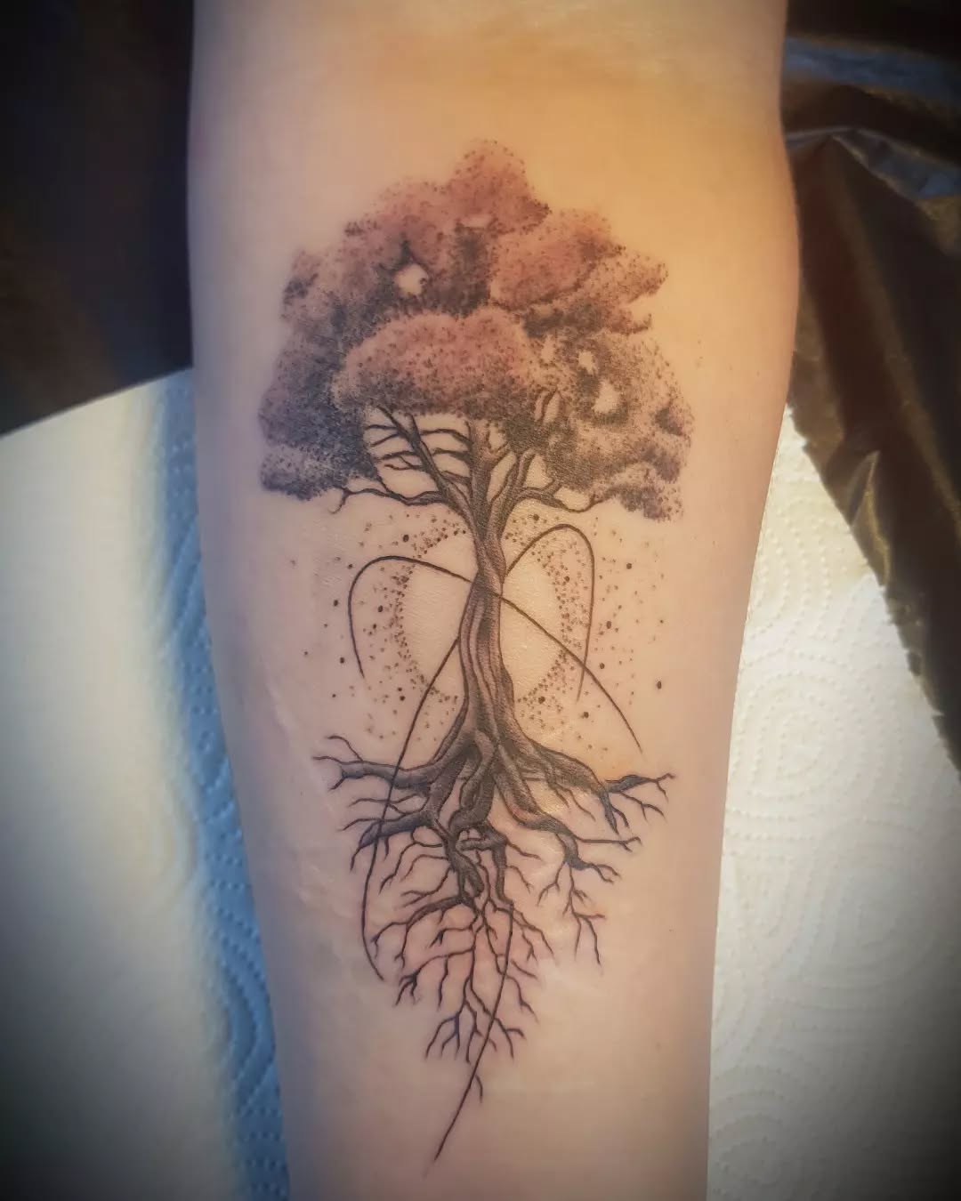 Elegant tree of life tattoo on the arm