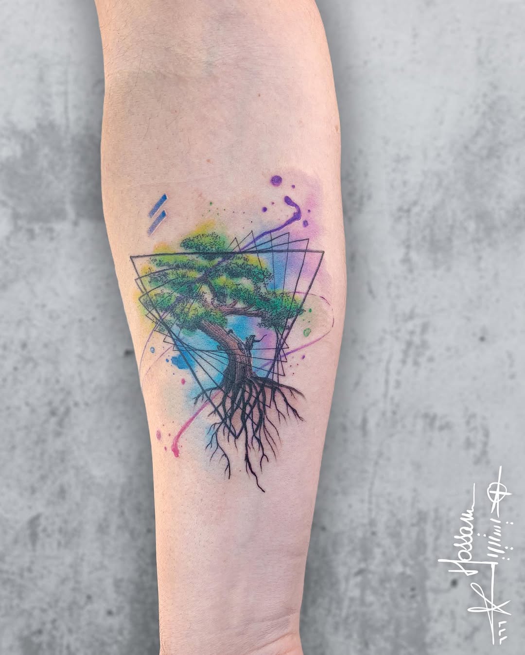 A colorful tree of life tattoo design