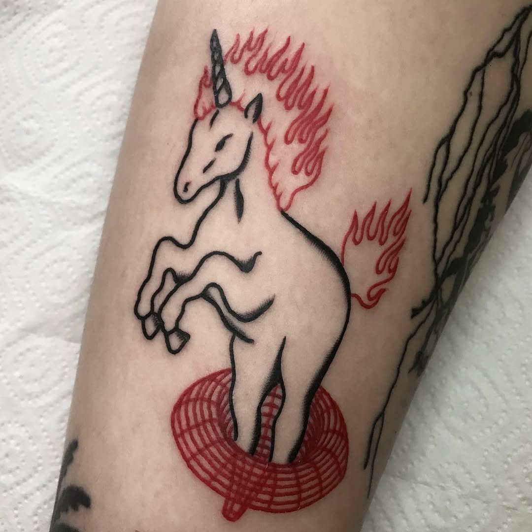 Bold Flaming Unicorn Tattoo Design