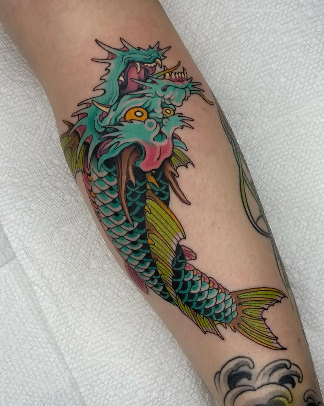 Colorful koi fish tattoo with vibrant details