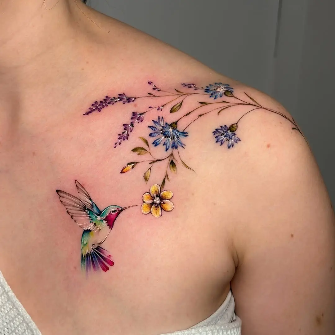 Vibrant Hummingbird and Floral Watercolor Tattoo