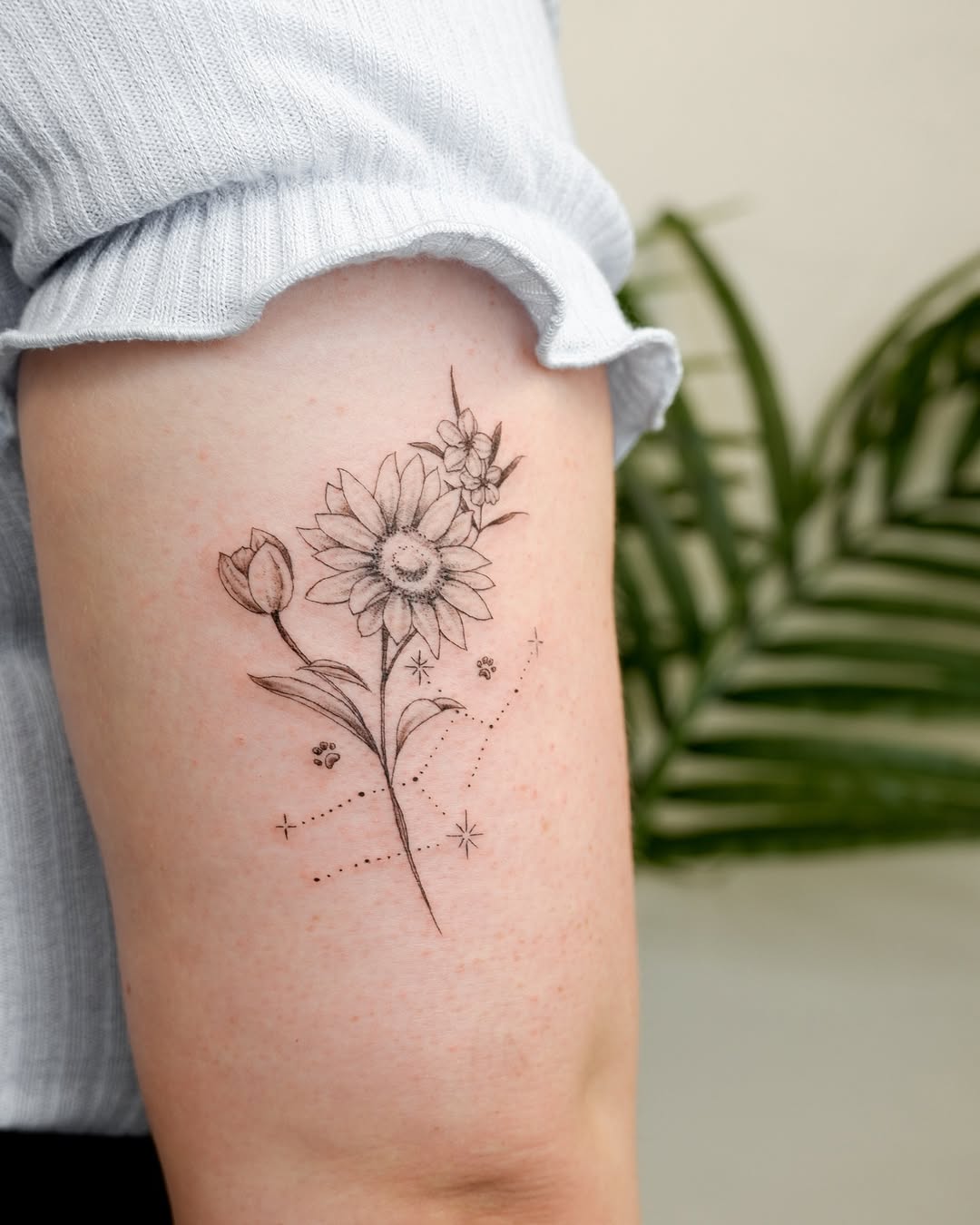 Elegant floral Virgo tattoo design on the arm