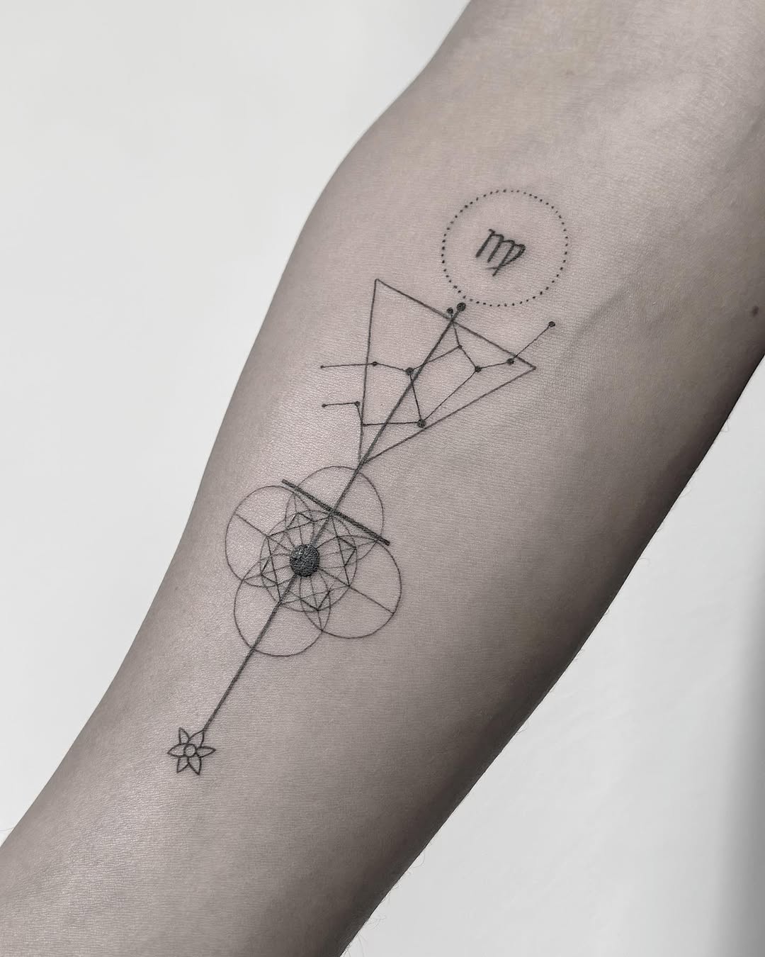 Elegant Virgo Tattoo with Geometric Elements