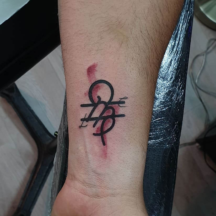 Minimalist Virgo Symbol Tattoo Design on Skin