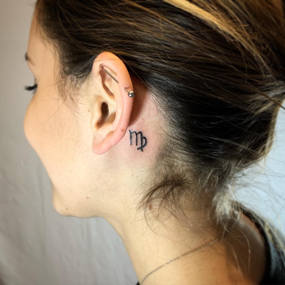 Elegant Virgo Tattoo Near the Ear