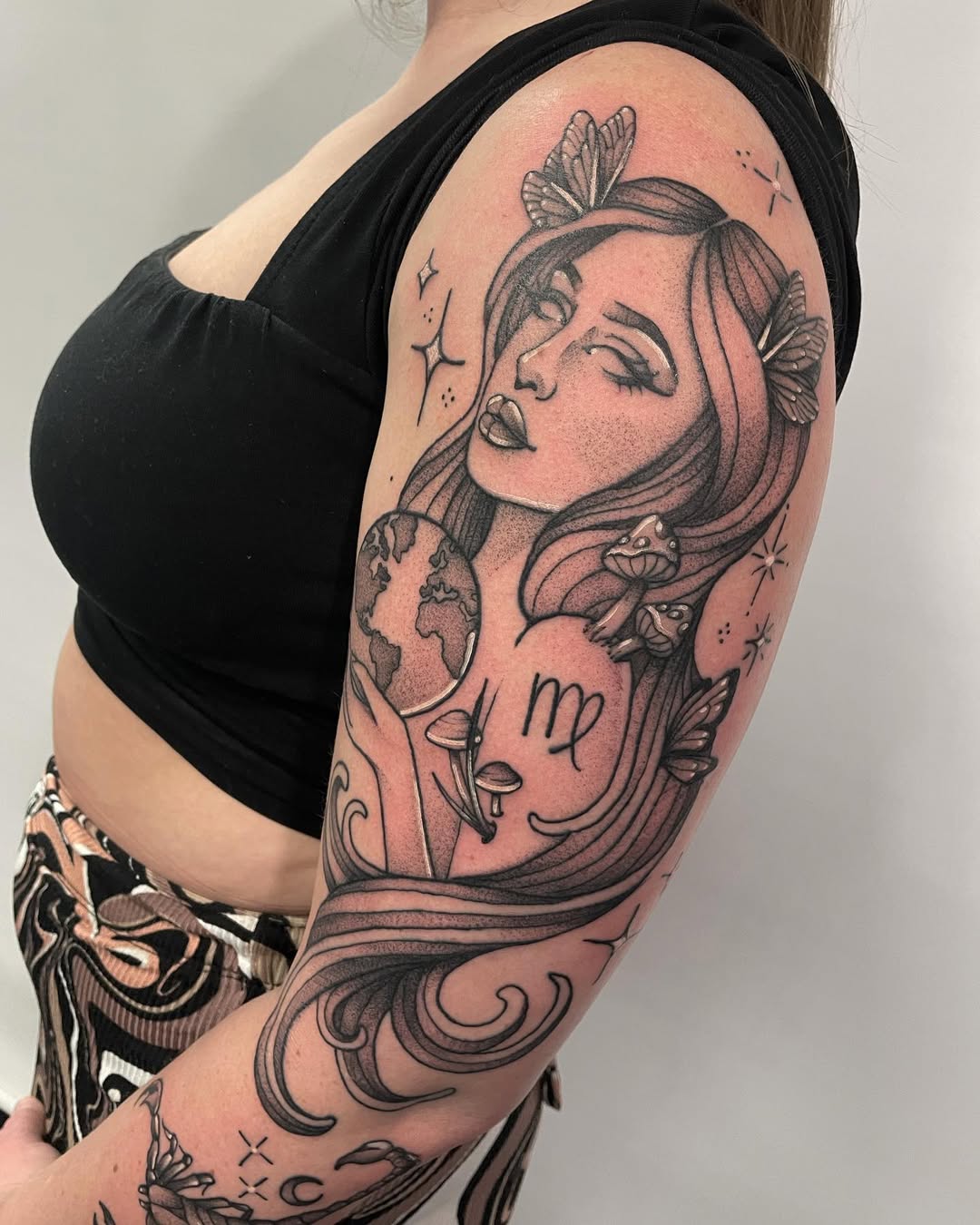 Stunning Virgo tattoo showcasing beauty and nature