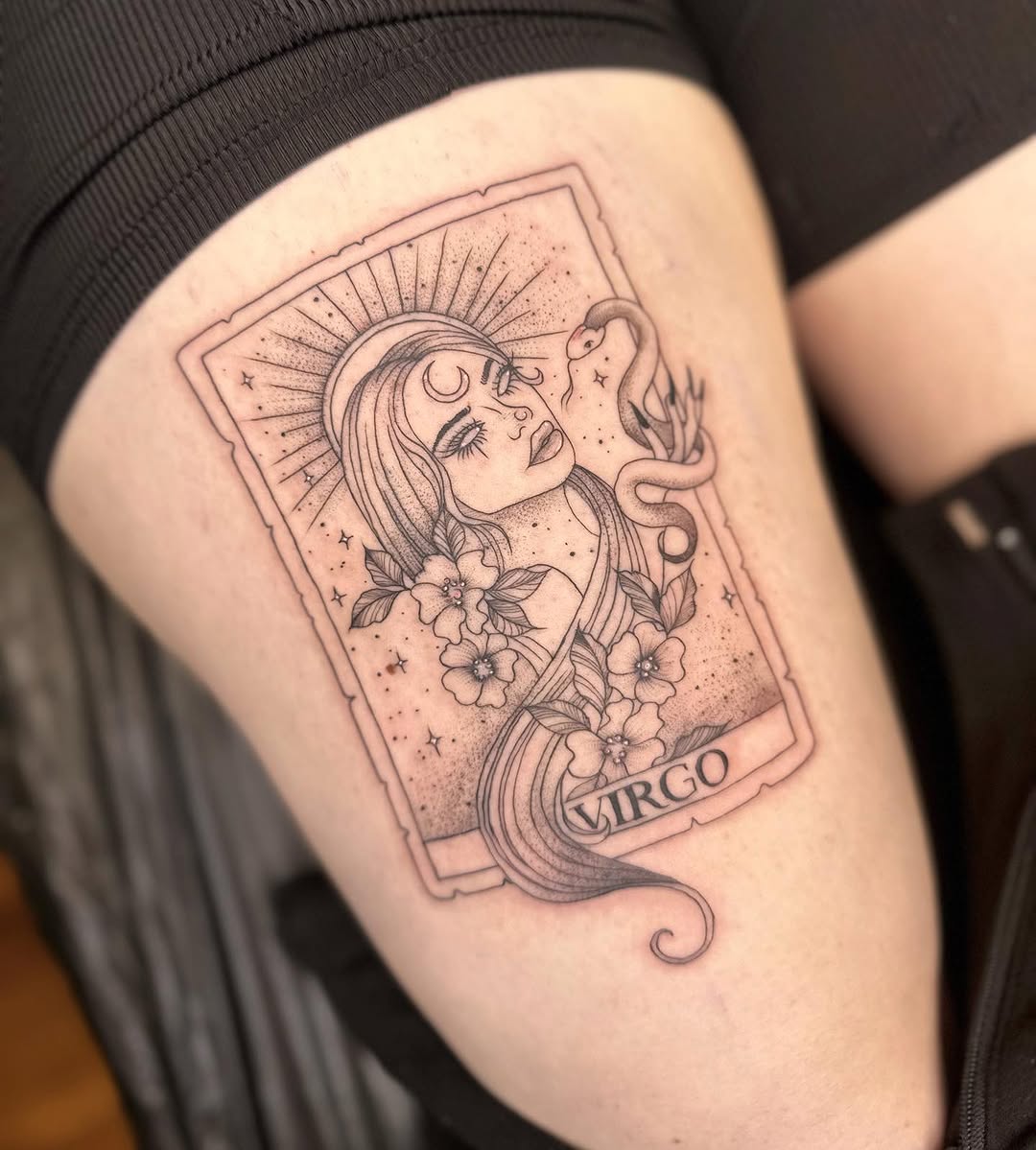 Elegant Virgo tattoo with celestial elements