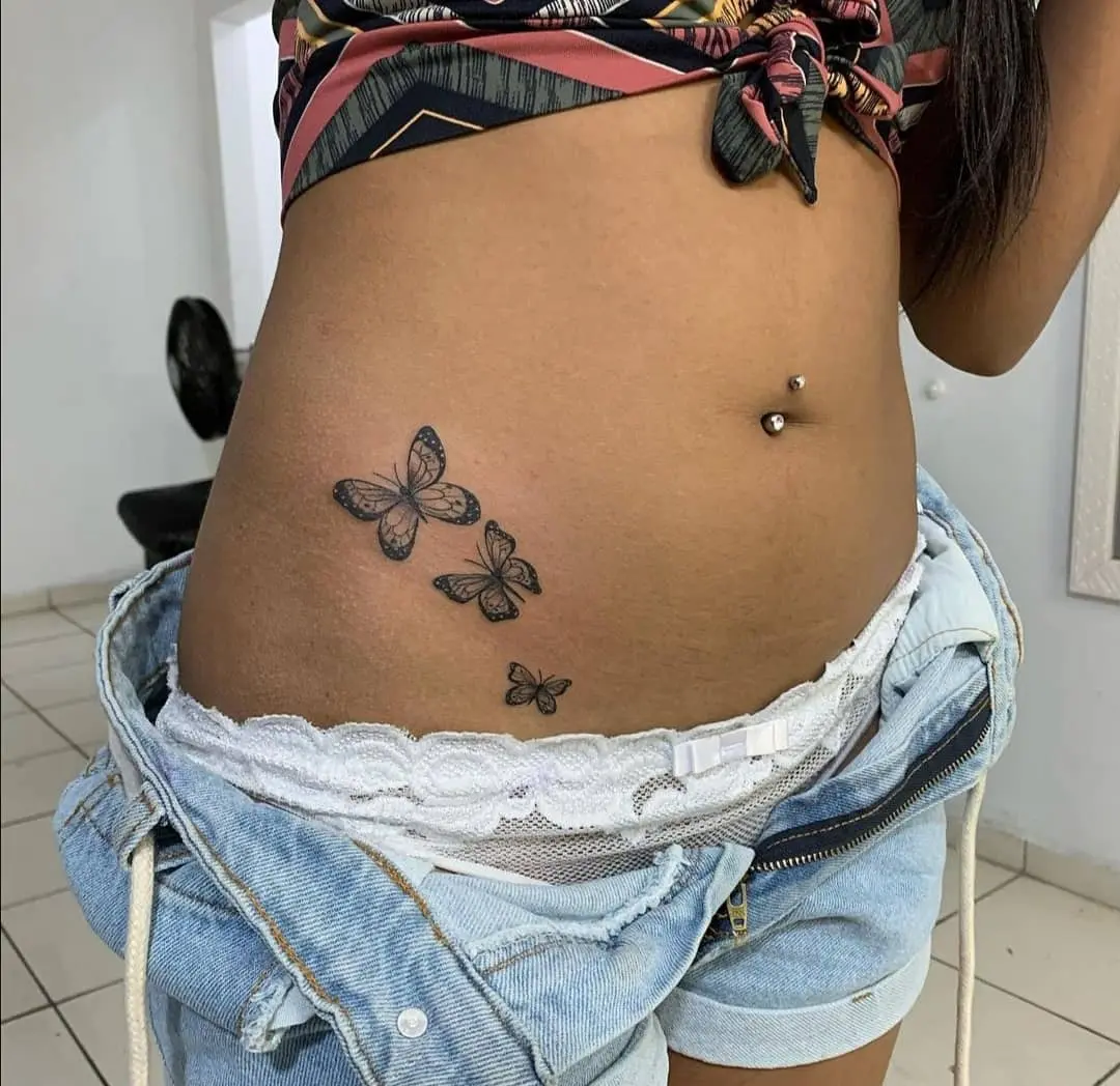 Elegant butterfly tattoos enhancing waist beauty