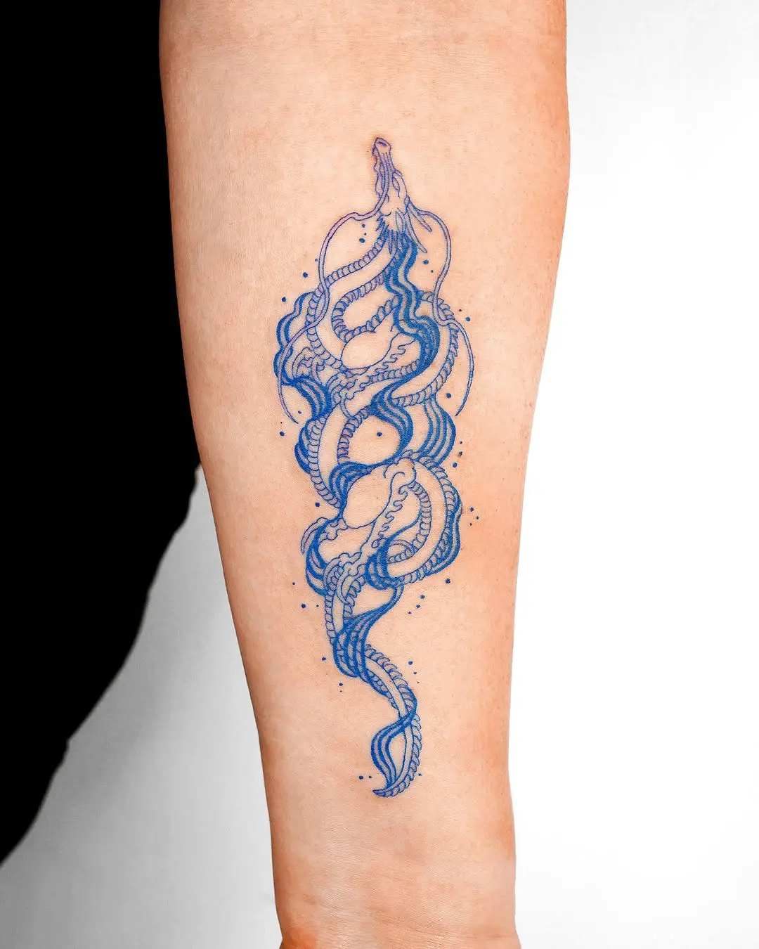 Elegant blue water snake tattoo design