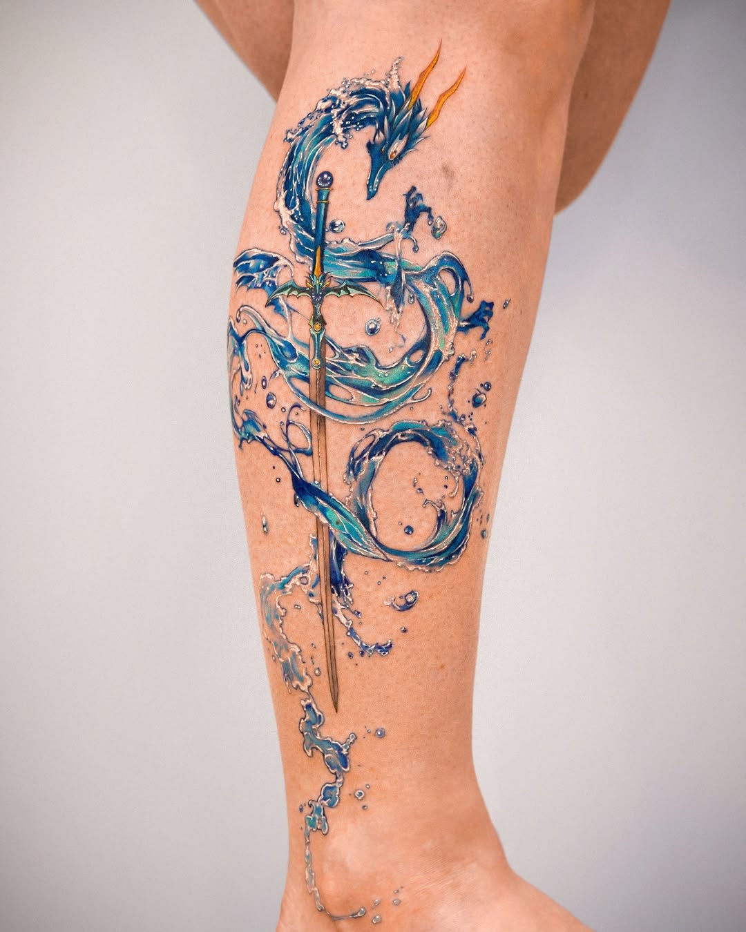Dynamic Water-Themed Sword Tattoo Design