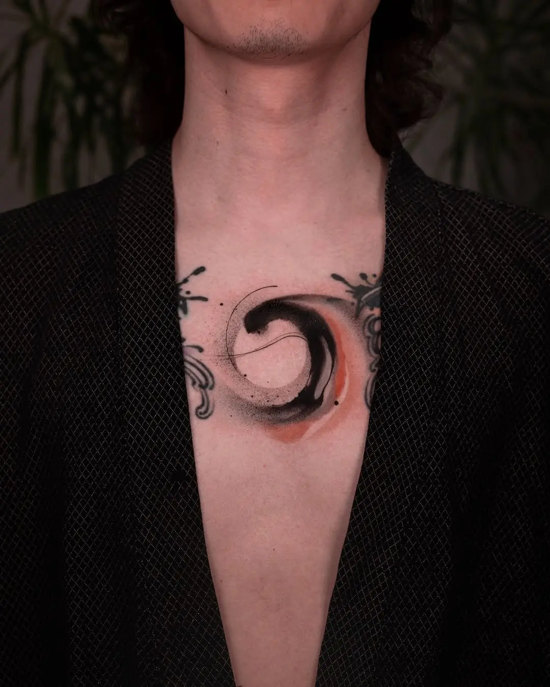 Fluid art merges beautifully with body ink.