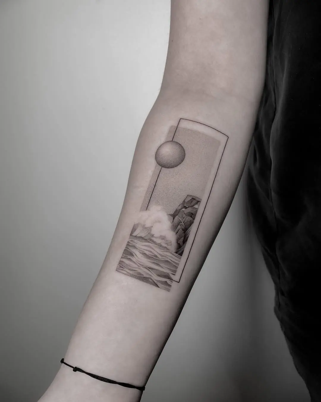 A Scenic Wave and Sun Tattoo Design