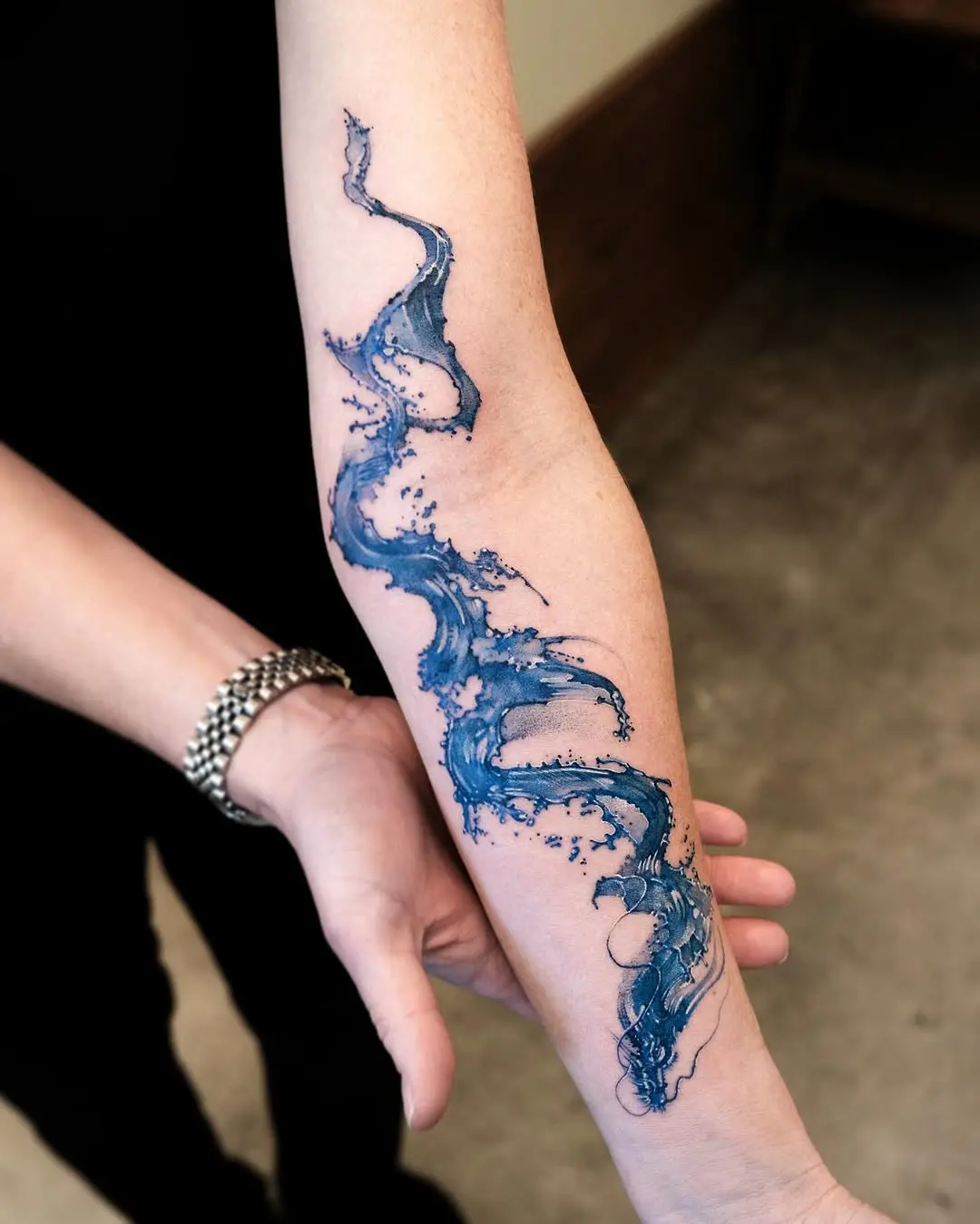 Stunning Water Wave Tattoo on Arm