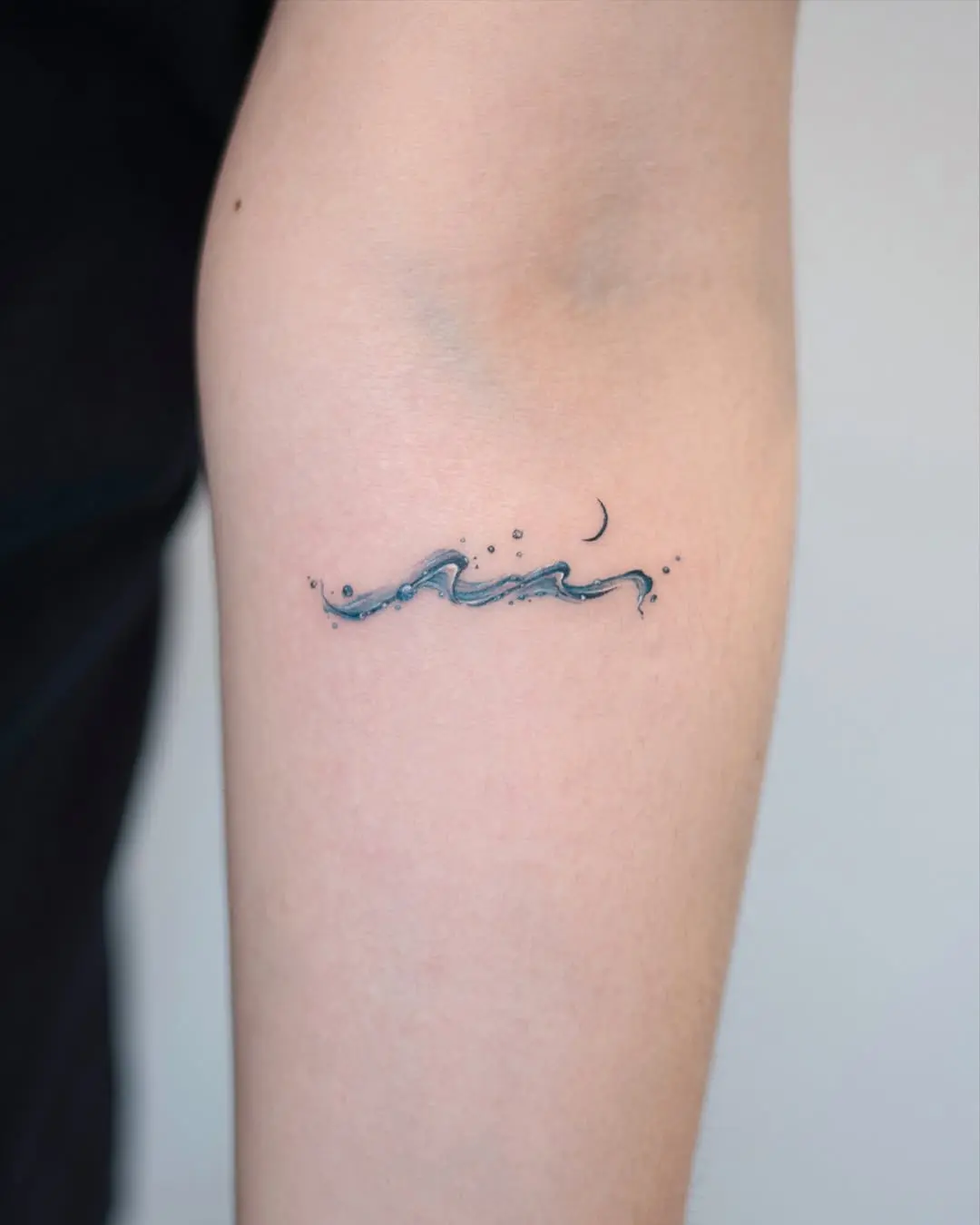 Minimalistic Waves Tattoo for Ocean Lovers