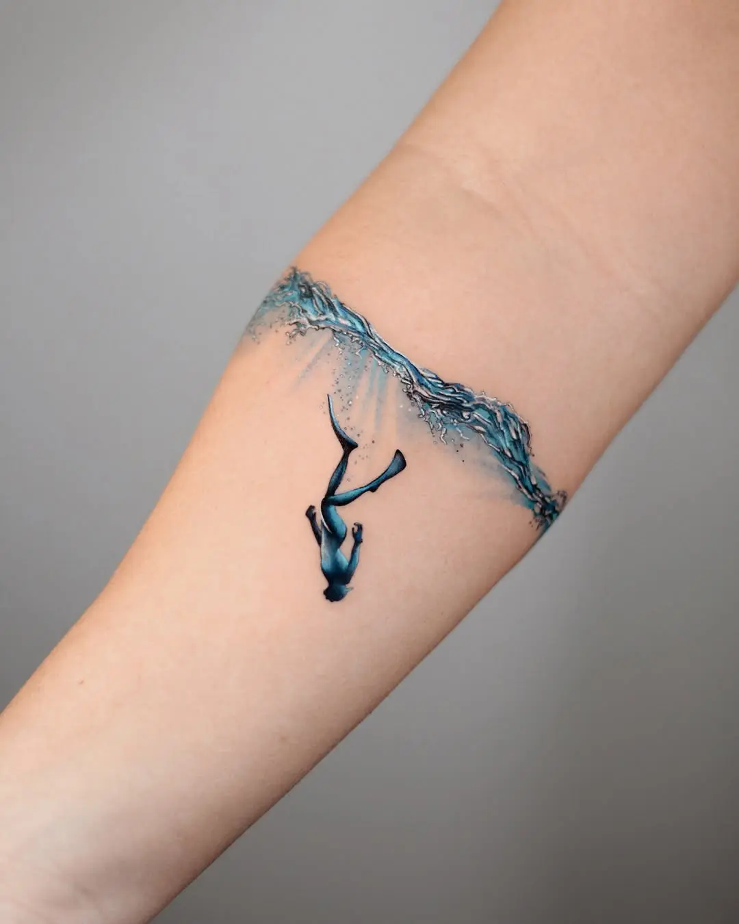 Elegant whale diving through artistic water waves