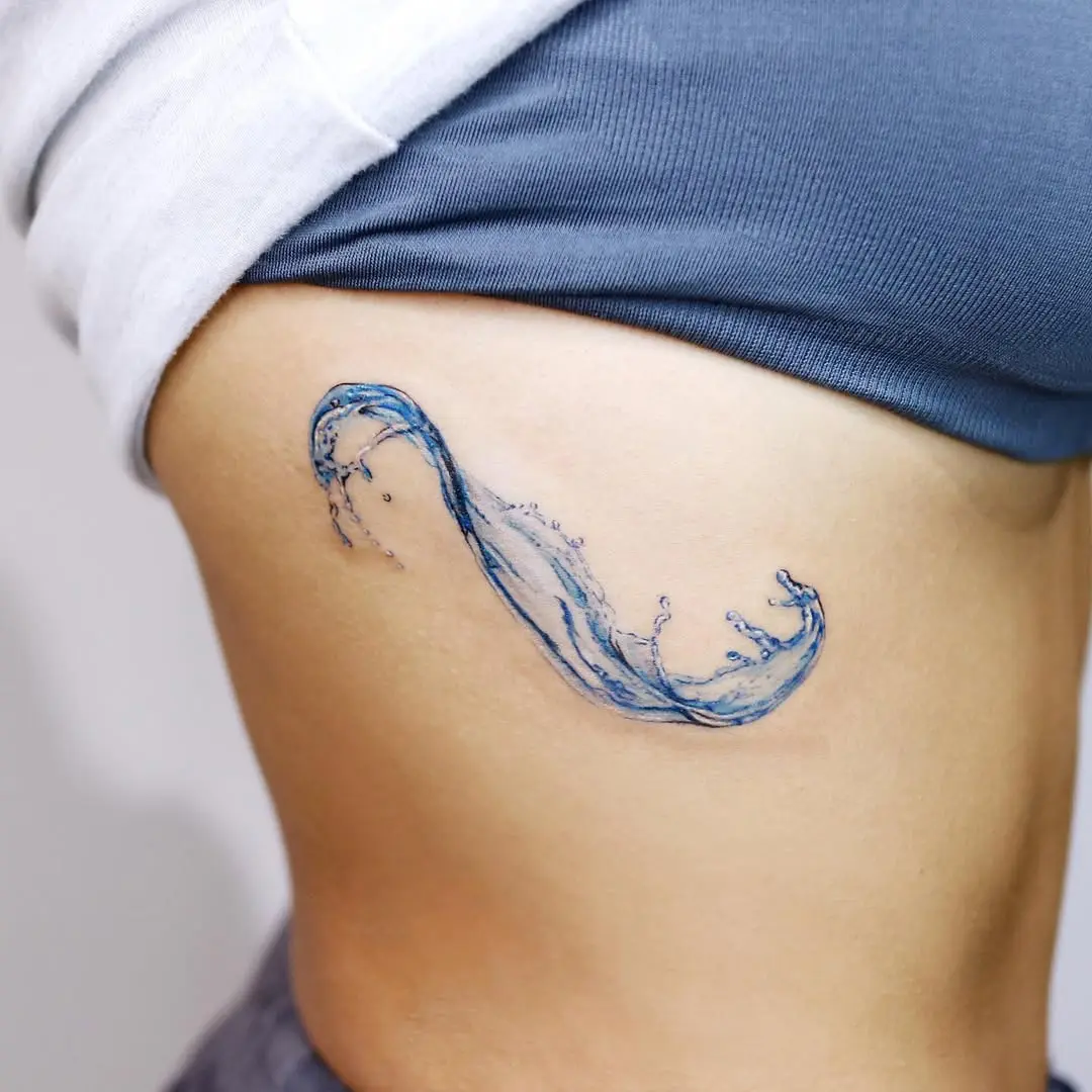 Elegant Wave Tattoo in Refreshing Blue Hues