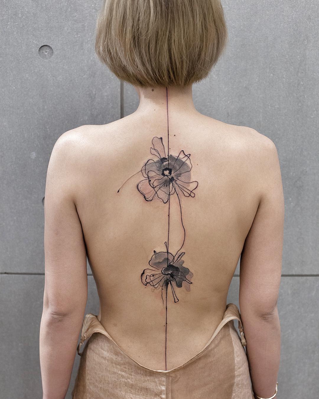 Stunning Watercolor Floral Tattoo on Back