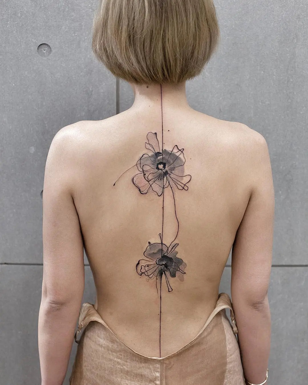 Stunning Watercolor Floral Tattoo on Back