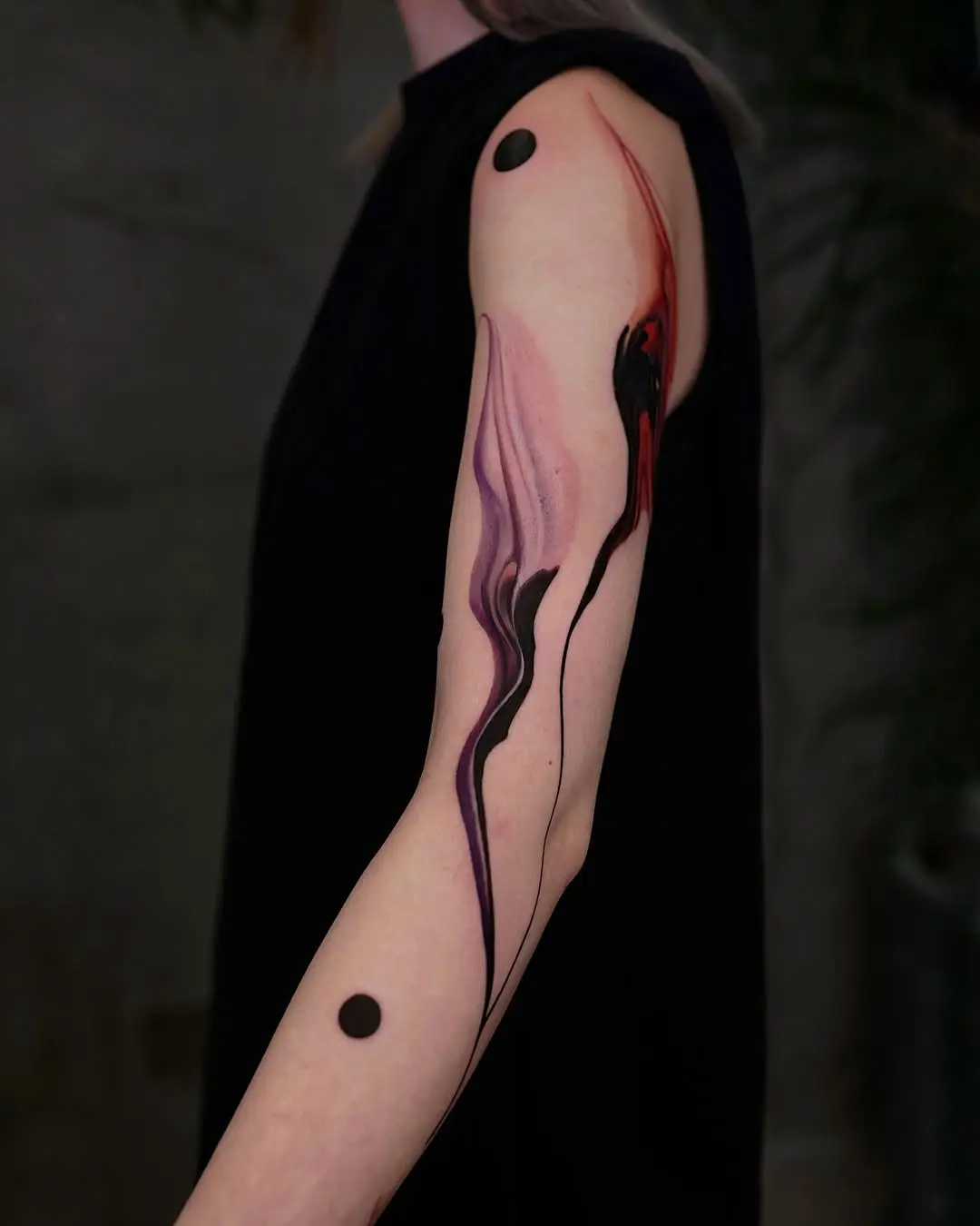 Fluid abstract designs in stunning watercolor tattoos