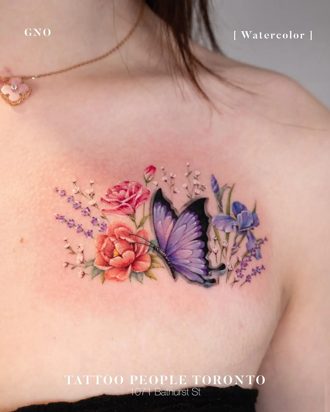 Vivid butterfly with blooming flowers tattoo art