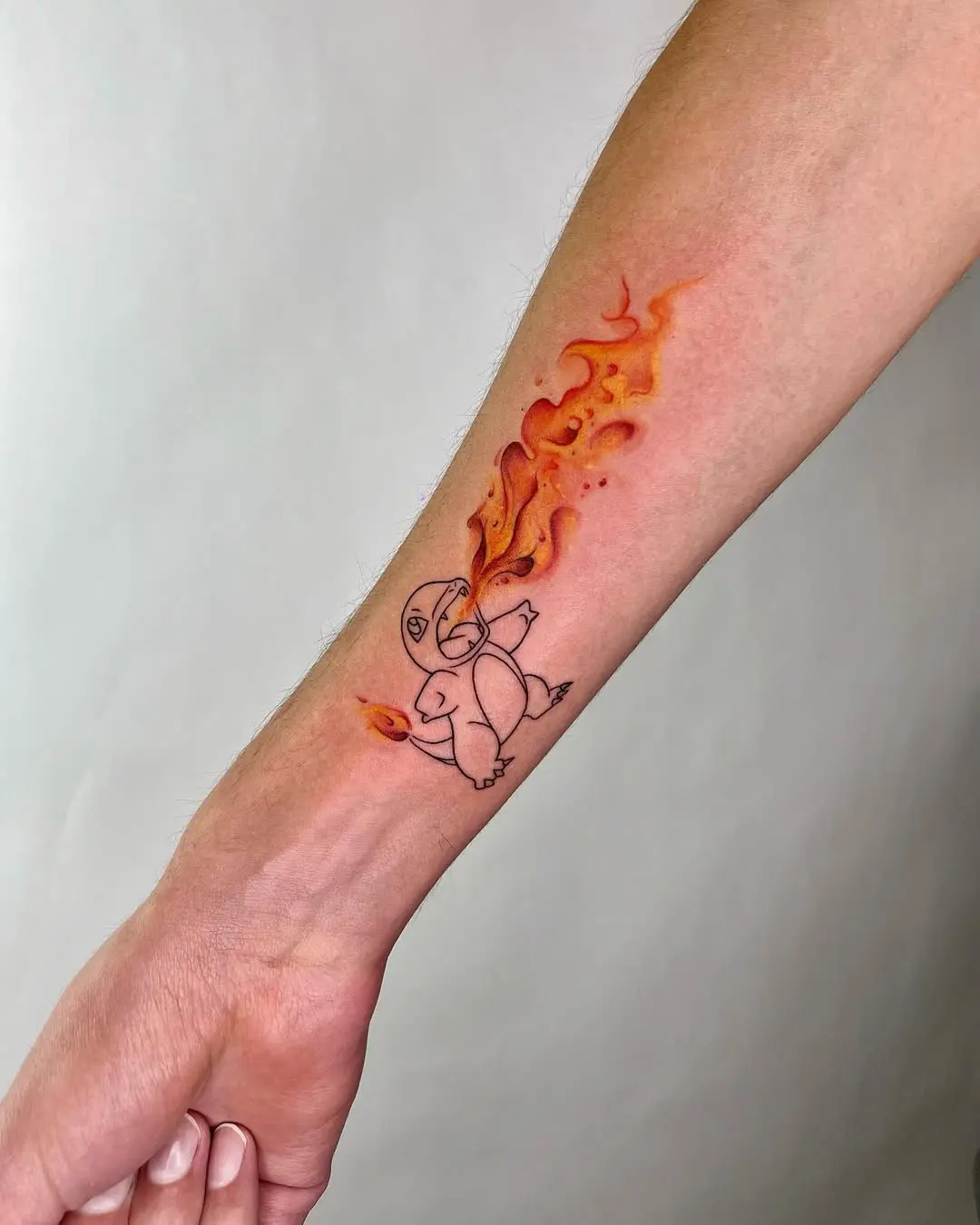 Vibrant watercolor flames surround a playful creature