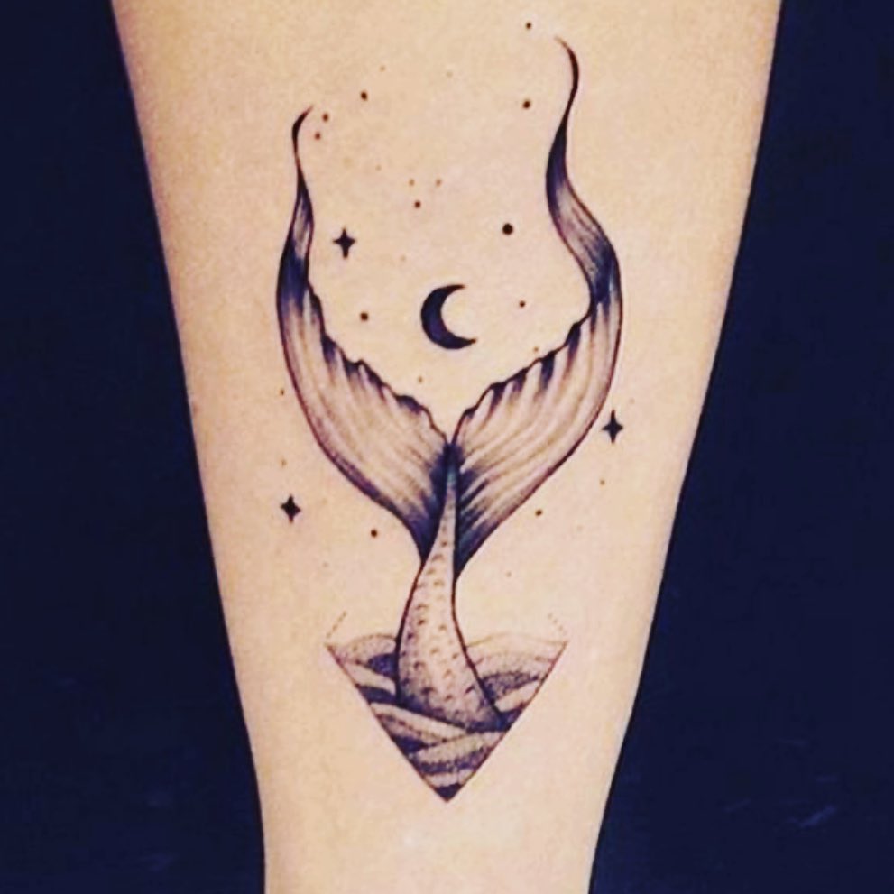 Elegant whale tail and moon tattoo design