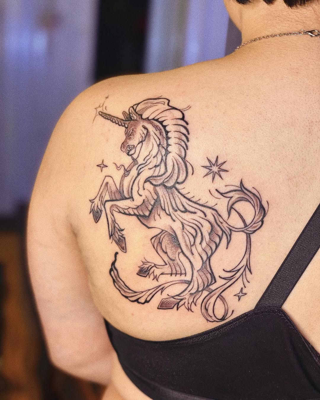 Stunning unicorn tattoo with elegant detailing