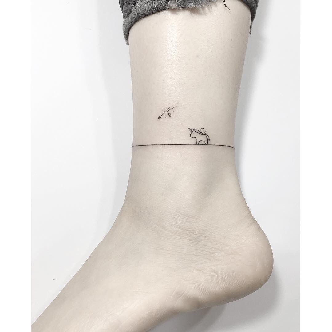 Enchanting unicorn tattoo with whimsical flair