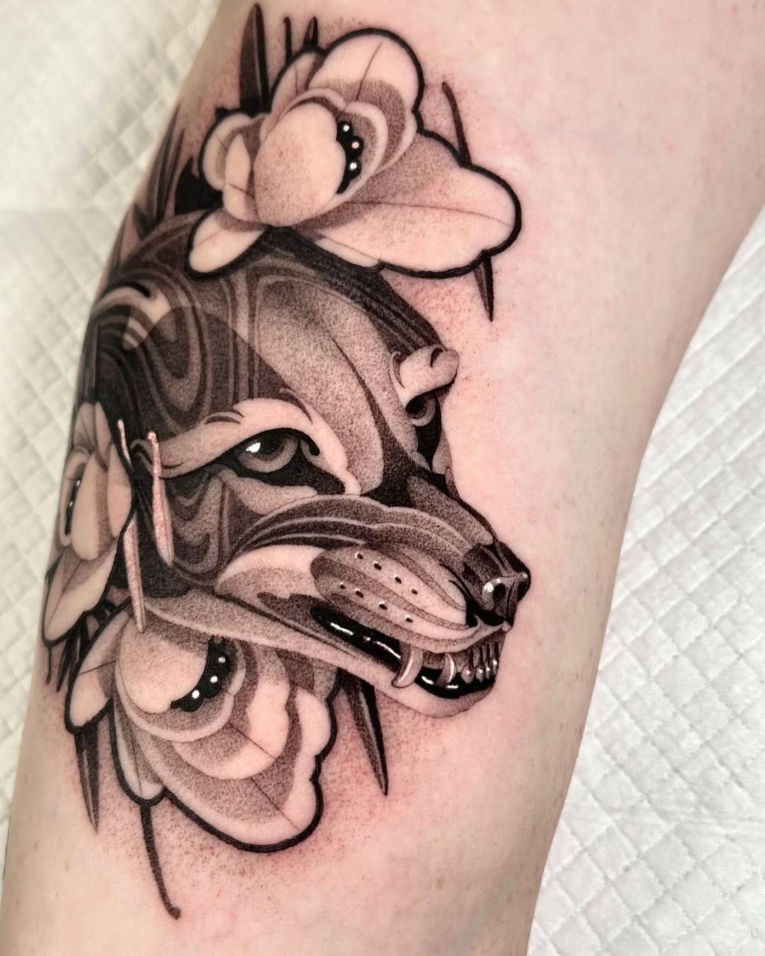 Intricate floral wolf tattoo design