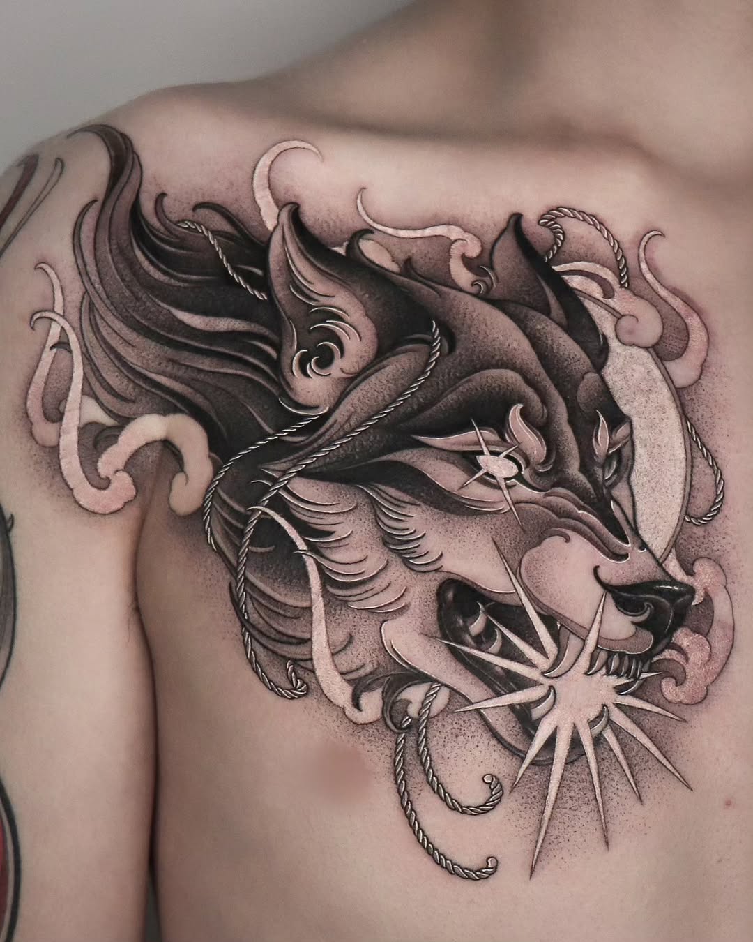 Bold wolf tattoo showcasing fierce artistry and detail