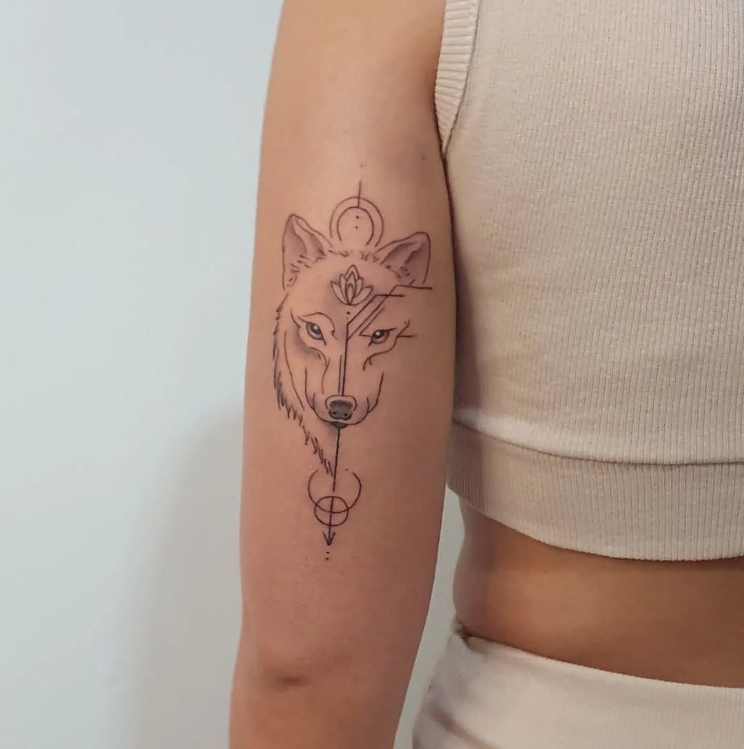 Intricate wolf tattoo with spiritual elements