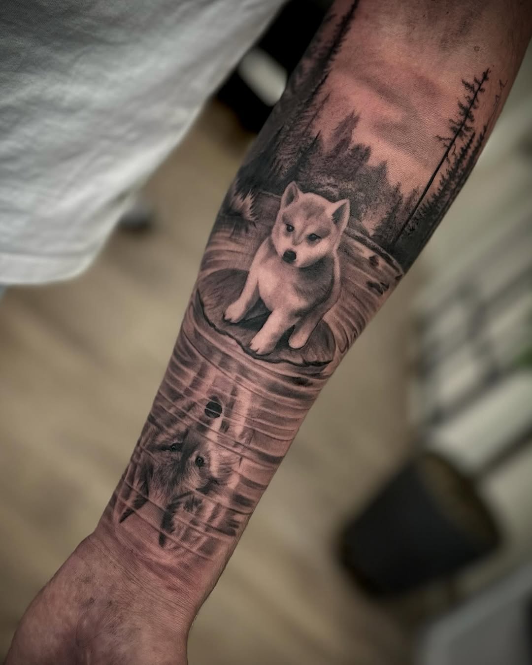 Captivating wolf tattoo with a serene background