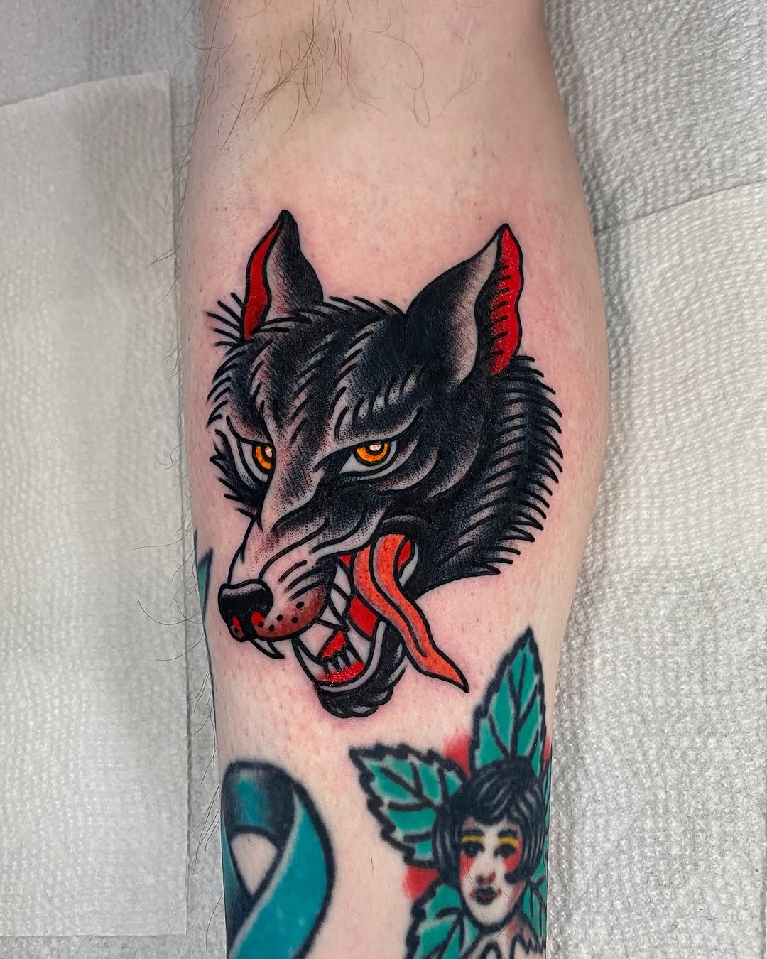 Striking vintage wolf tattoo with bold colors