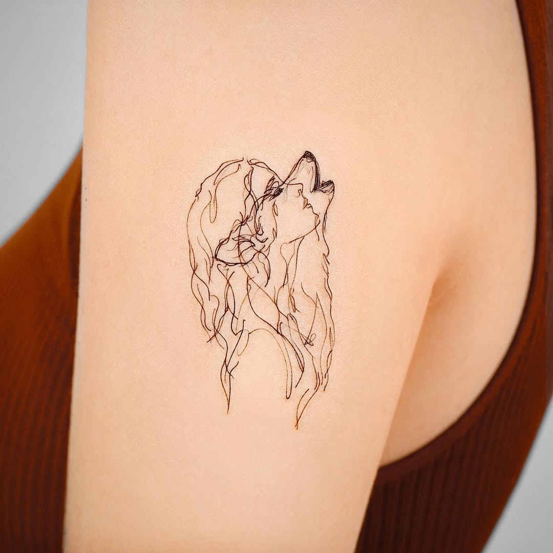 Minimalist wolf tattoo with elegant outlines