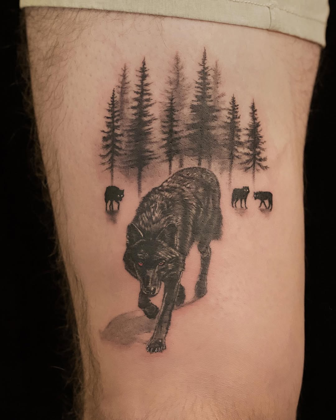 Majestic wolf tattoo with forest backdrop