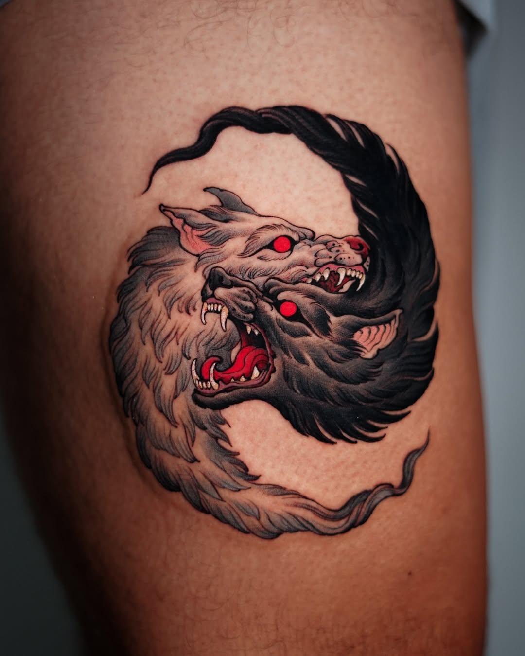 Intricate dual-headed wolf tattoo design