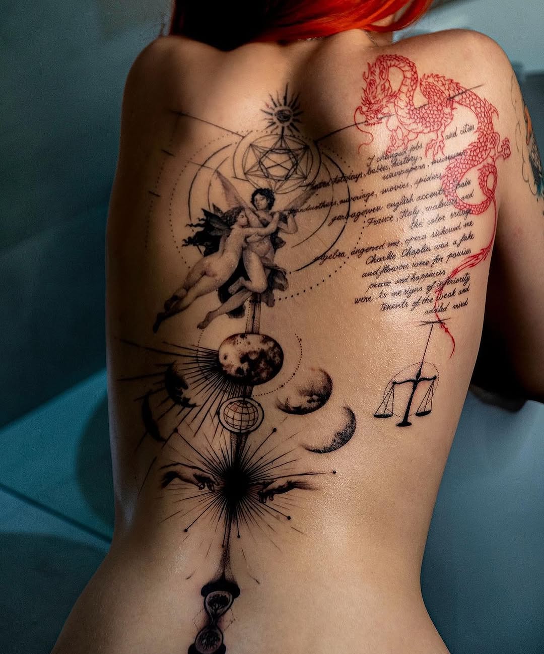 Intricate back tattoo featuring celestial elements