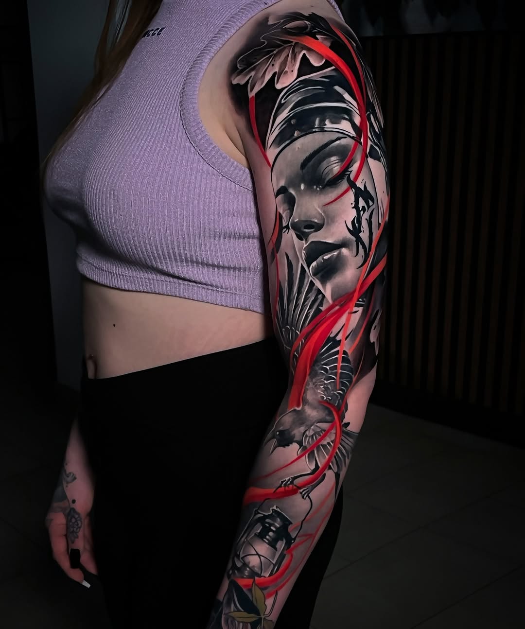 Striking female arm tattoo with vibrant details