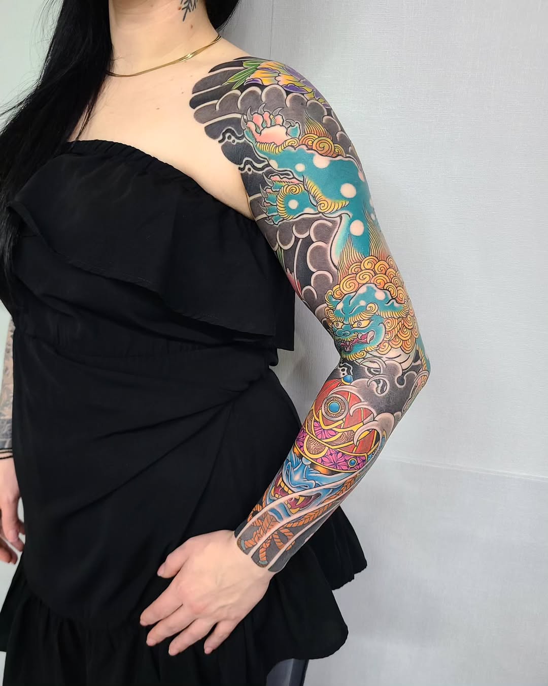 Vibrant Dreams: A Stunning Sleeve Tattoo