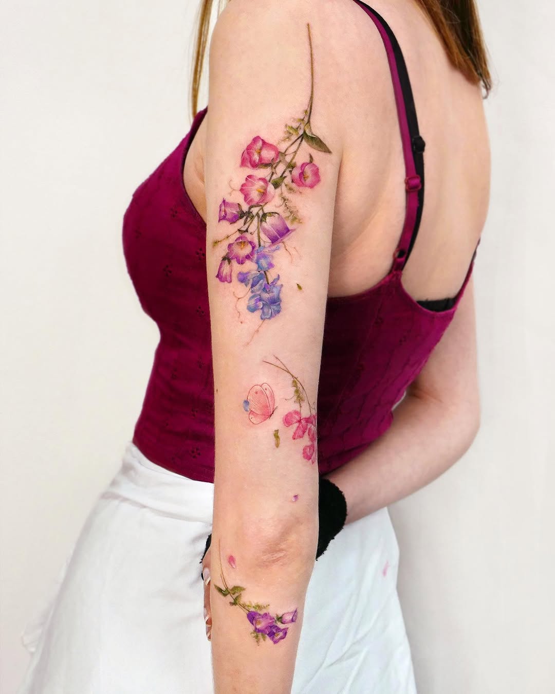 Stunning floral sleeve tattoo with vibrant colors