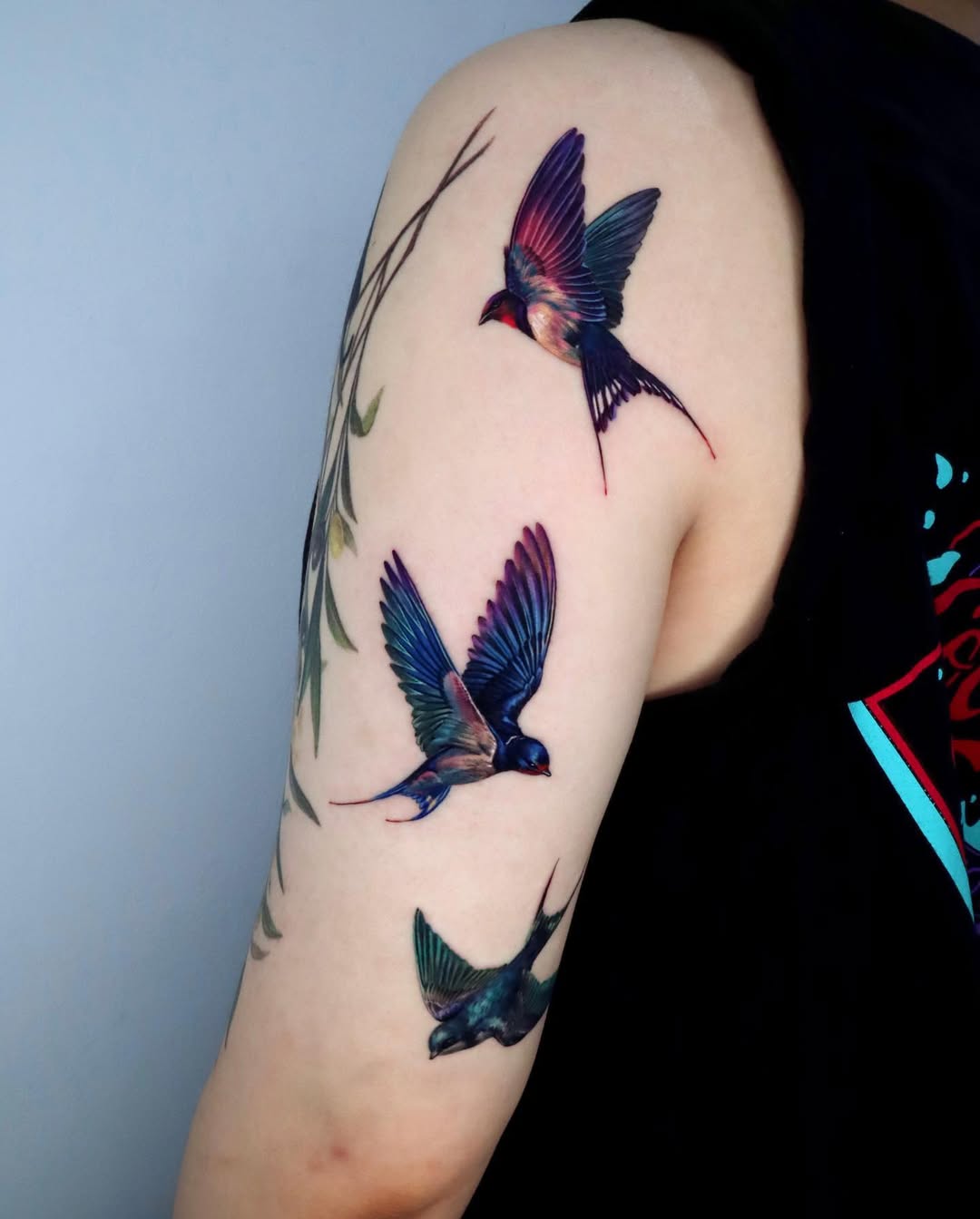 Vibrant Bird Sleeve Tattoo Design