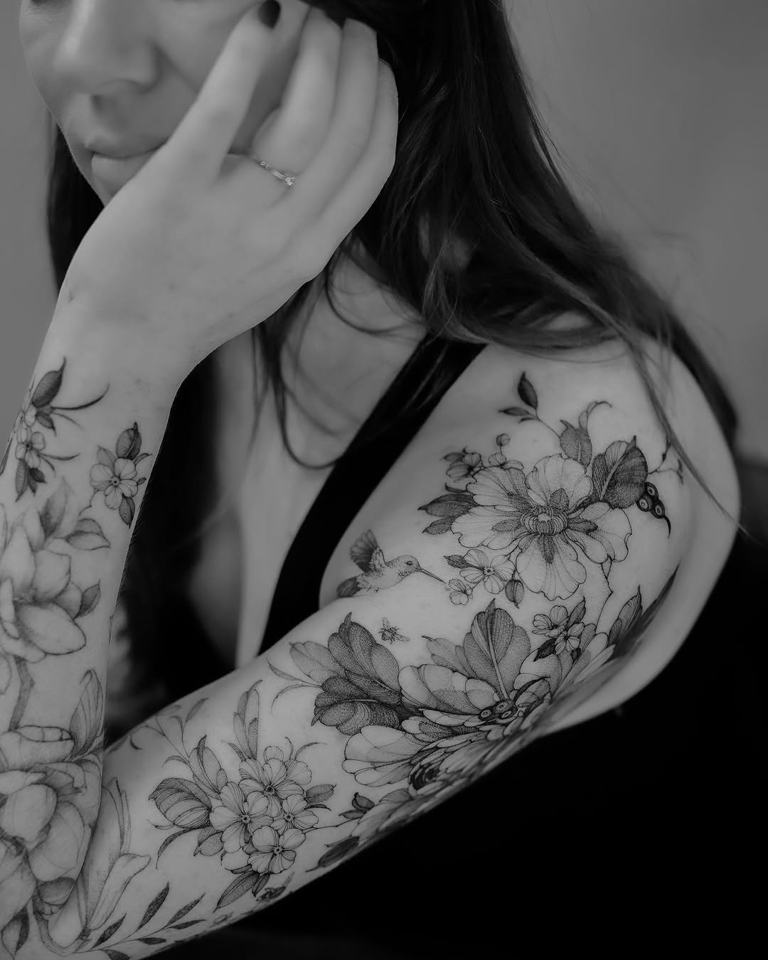 Elegant Floral Sleeve Tattoo Artistry