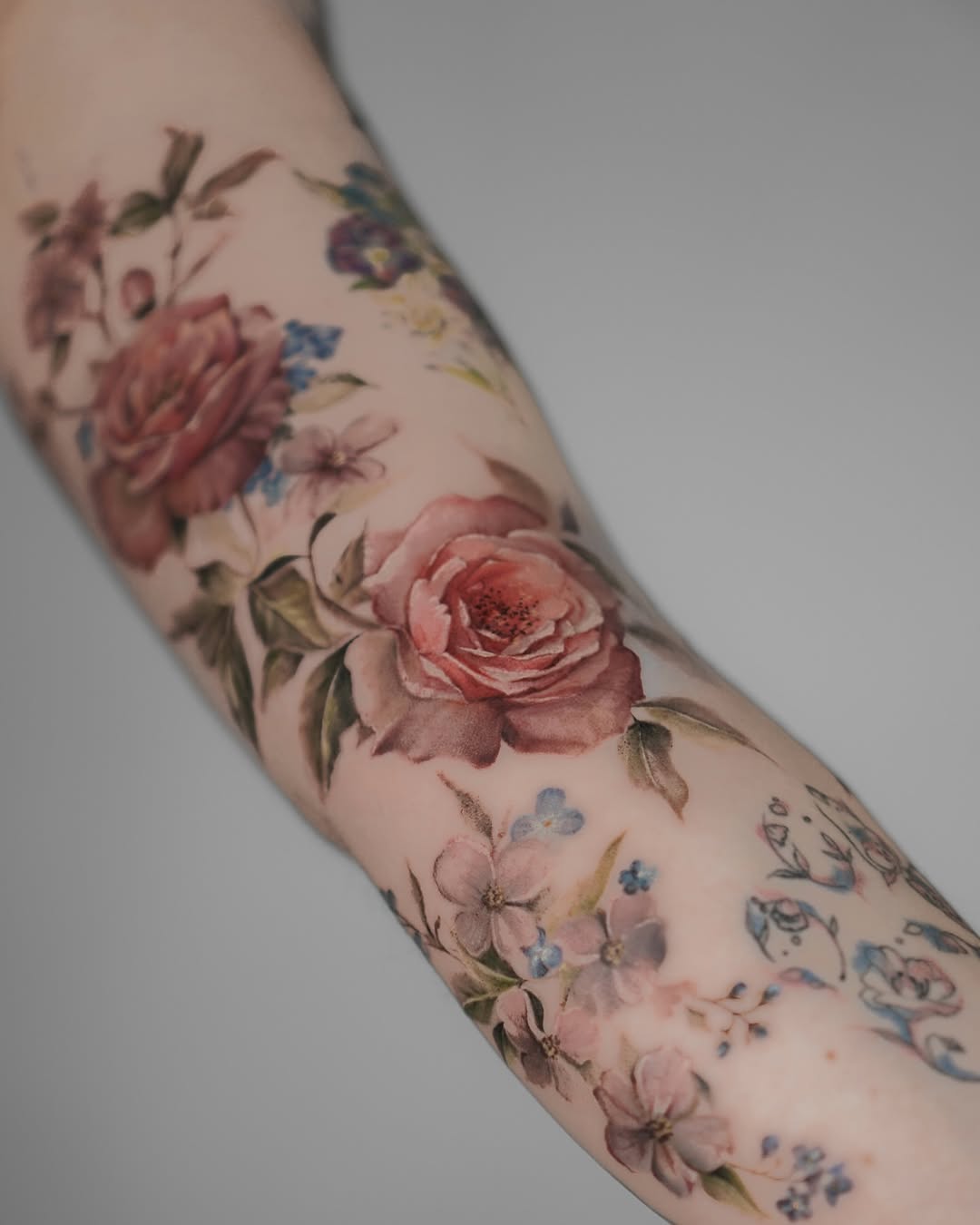 Stunning Floral Sleeve Tattoo Design for Women