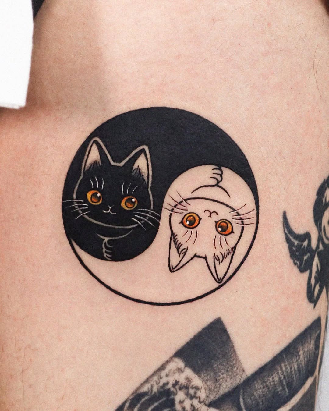 Cute cats in playful yin yang design