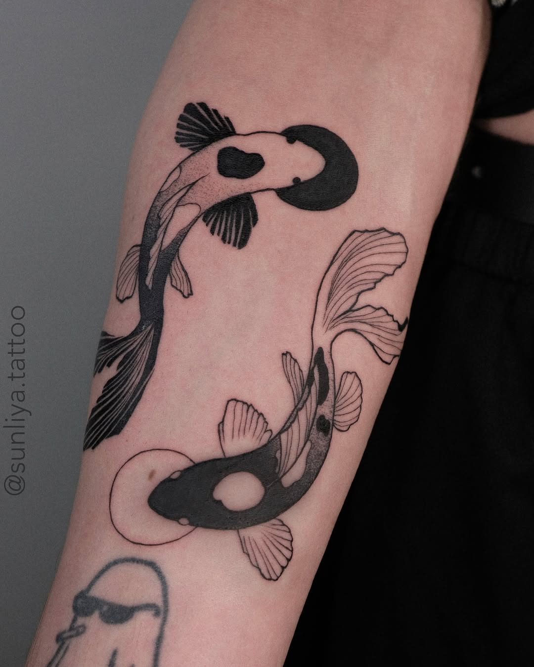 Elegant yin yang koi fish tattoo design