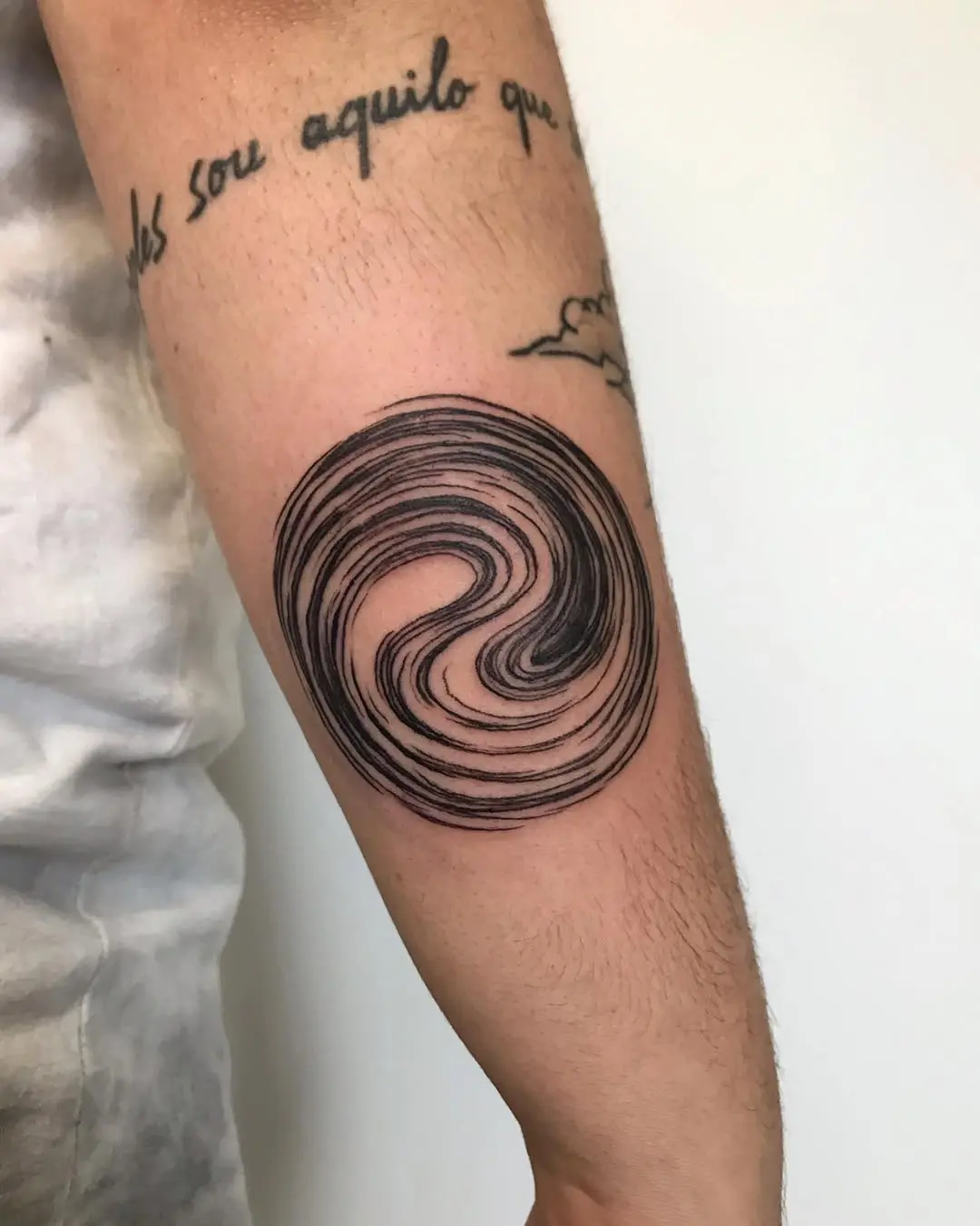 Minimalist Yin Yang Tattoo on Forearm