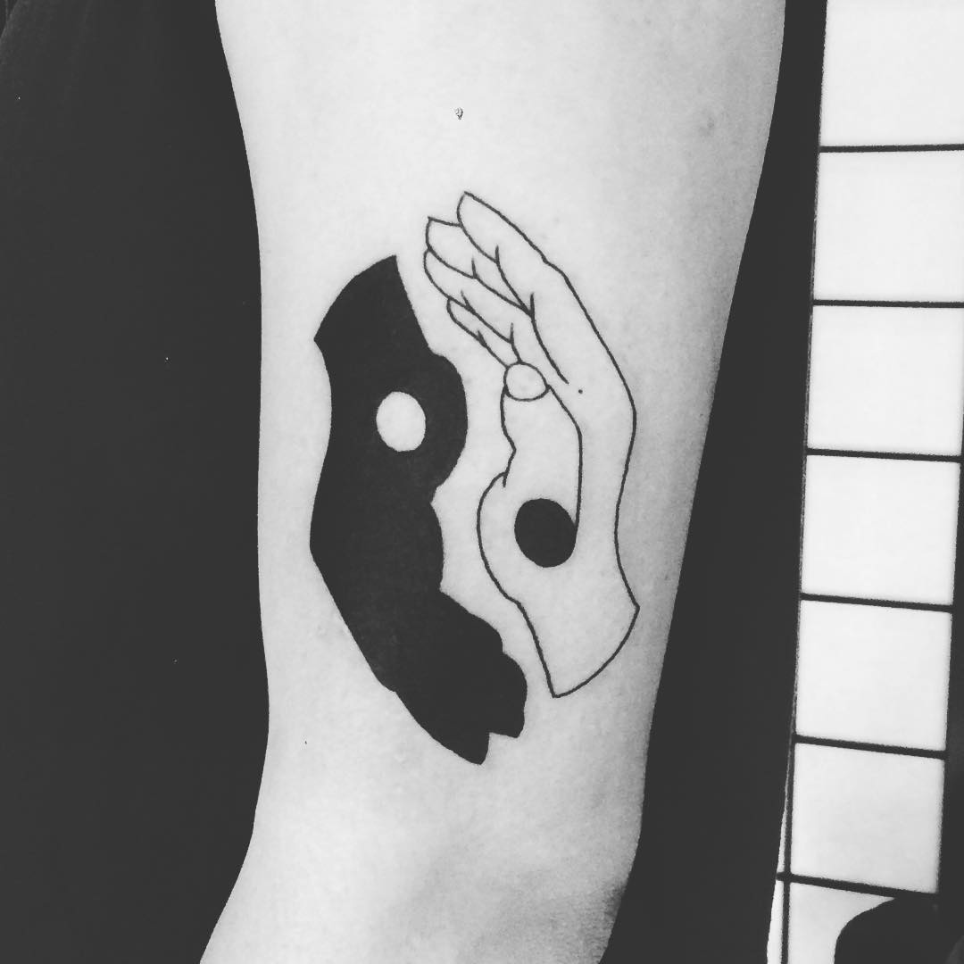 Intricate Yin Yang Hand Tattoo Design