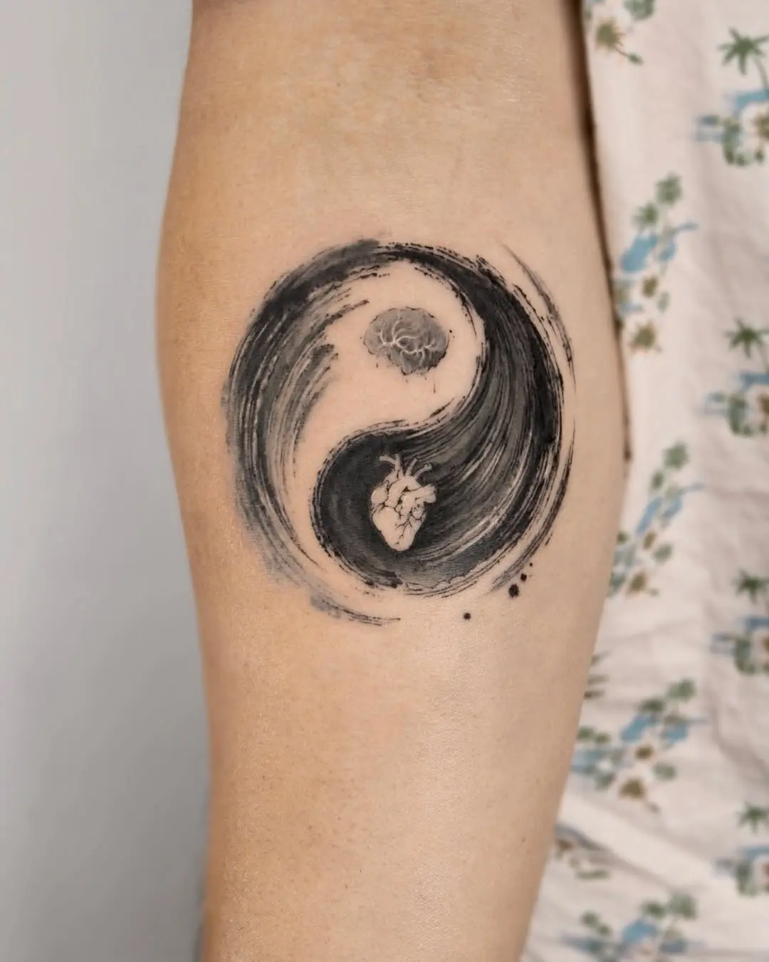 Symbolic harmony of heart and mind tattoo