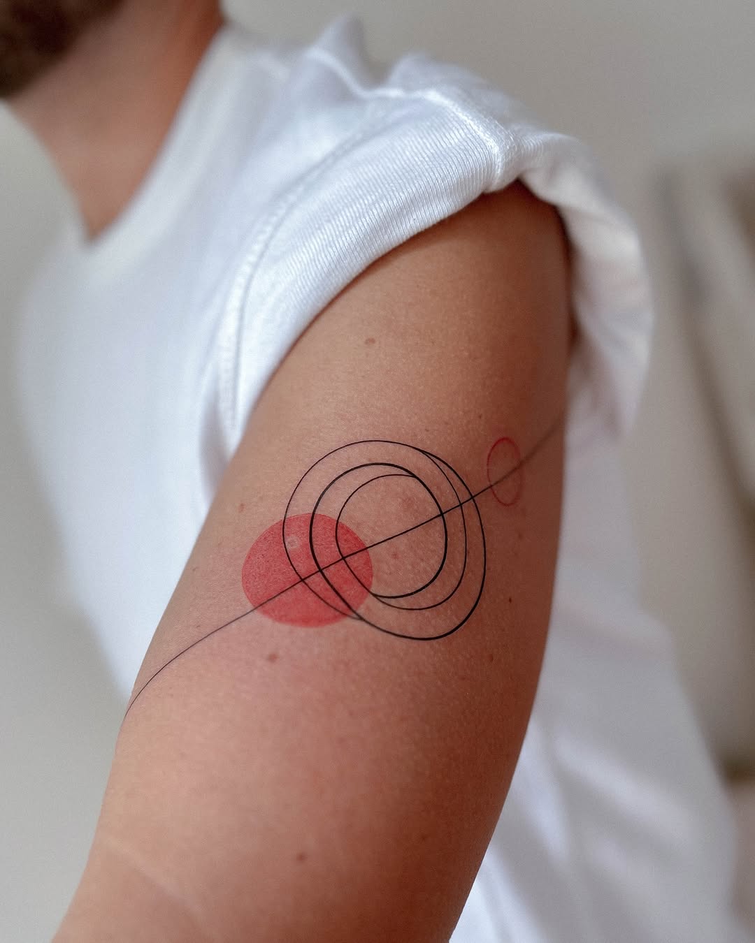 Minimalist Yin Yang Tattoo with Red Accents